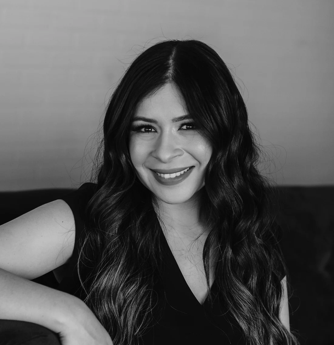 An archival black-and-white editorial portrait of Sarah Ayala